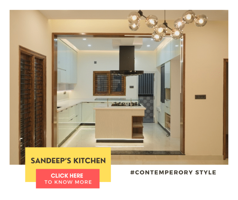 A contemporary kitchen interior design by Olangana in Bangalore, featuring elegant white cabinetry, a stylish island hob, and modern lighting, exemplifying functional beauty.
