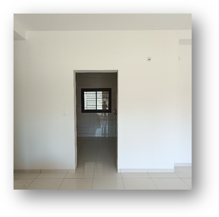 Bare shell apartment in Bangalore, ready for modern interior transformation by Olangana Design, showcasing the initial phase of a project.
