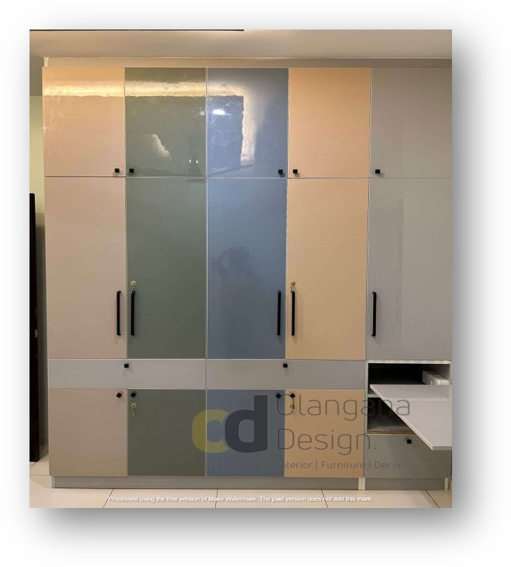 Modern multi-colored wardrobe and custom storage unit by Olangana Design, enhancing a contemporary interior in Bangalore.