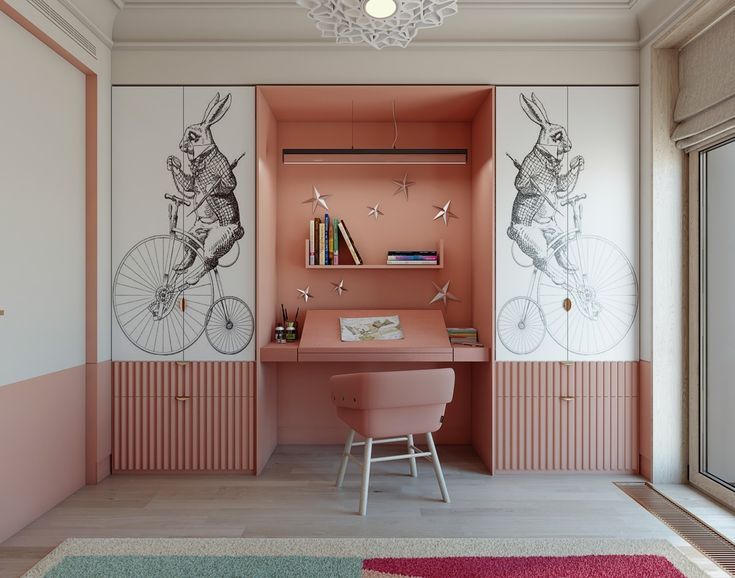 Whimsical children's room interior design by Olangana in Bangalore, featuring custom pink and white built-in wardrobes with rabbit illustrations, a matching study desk, and integrated shelving.