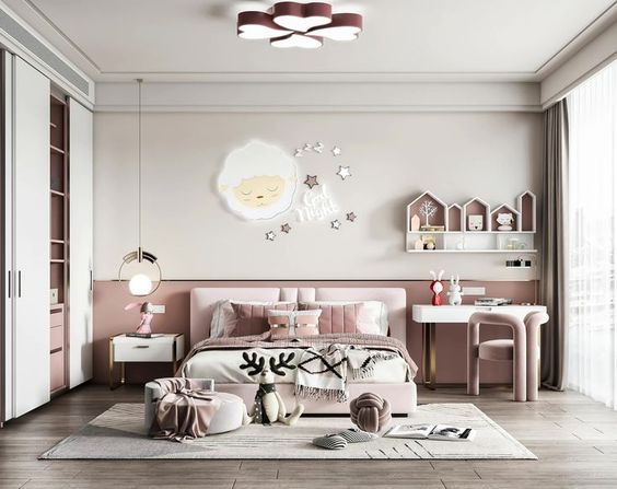 Pink and white modern girl's bedroom interior design by Olangana Design in Bangalore, featuring a plush bed, cute sheep wall decor, and functional storage.