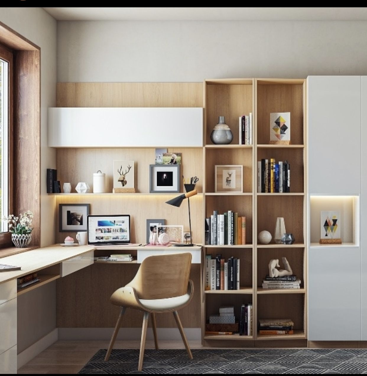 A modern and inviting home office interior design by Olangana in Bangalore, featuring a sleek L-shaped wooden desk, integrated shelving with warm LED lighting, and a stylish ergonomic chair. This functional workspace showcases a harmonious blend of natural wood and crisp white finishes.