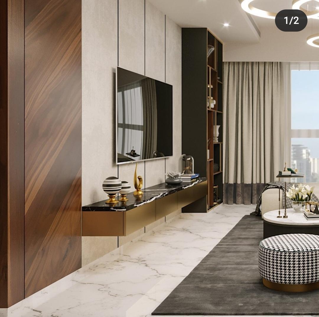 An elegant living room Interior Design by Olangana in Bangalore, showcasing a sophisticated floating media console with black marble top, golden accents, rich dark wood paneling, pristine white marble flooring, and a chic houndstooth ottoman, reflecting modern luxury.