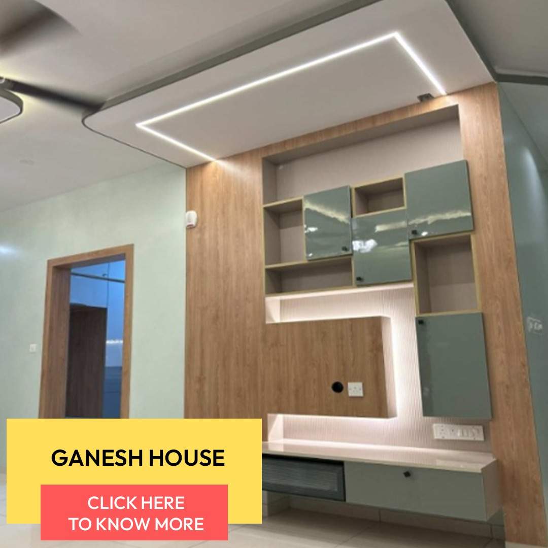 Modern TV unit design by Olangana Designs for a Bangalore living room featuring wall paneling, storage cabinets, and ambient lighting.