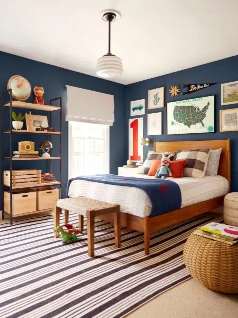 Modern kids’ bedroom with pastel color palette designed by Olangana Designs for a Bangalore home featuring soft tones, cozy bed, and smart storage.