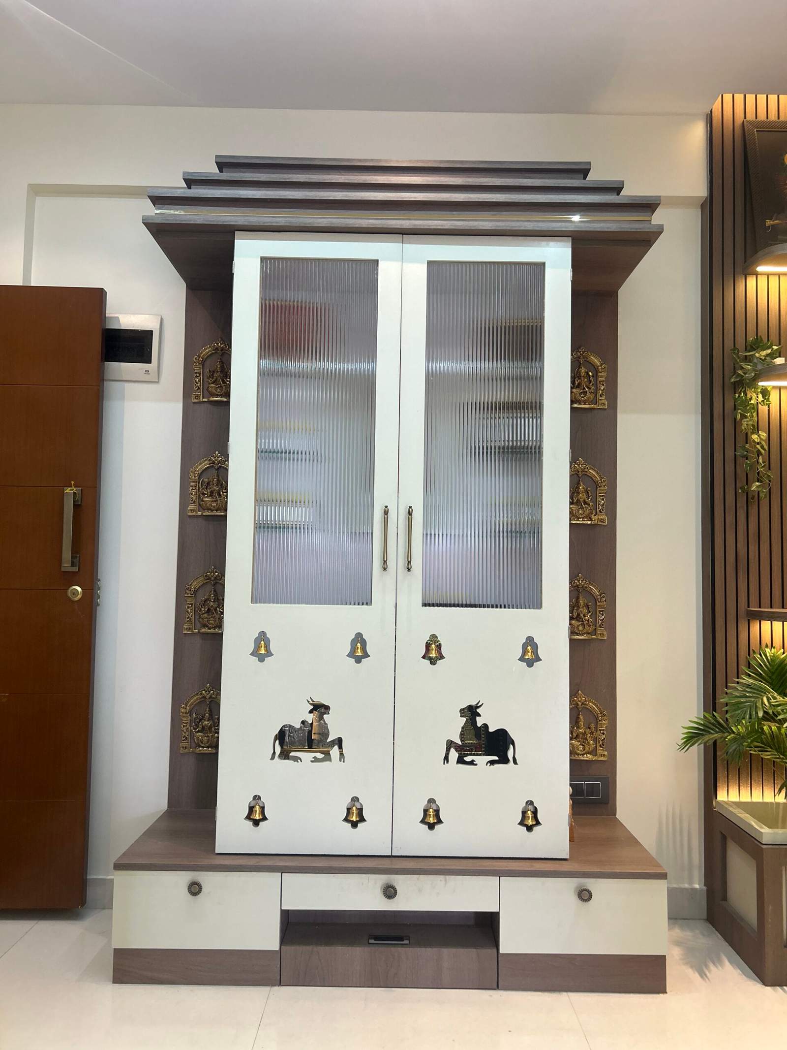 Contemporary pooja room area in a Bangalore residence by Olangana Design’s.