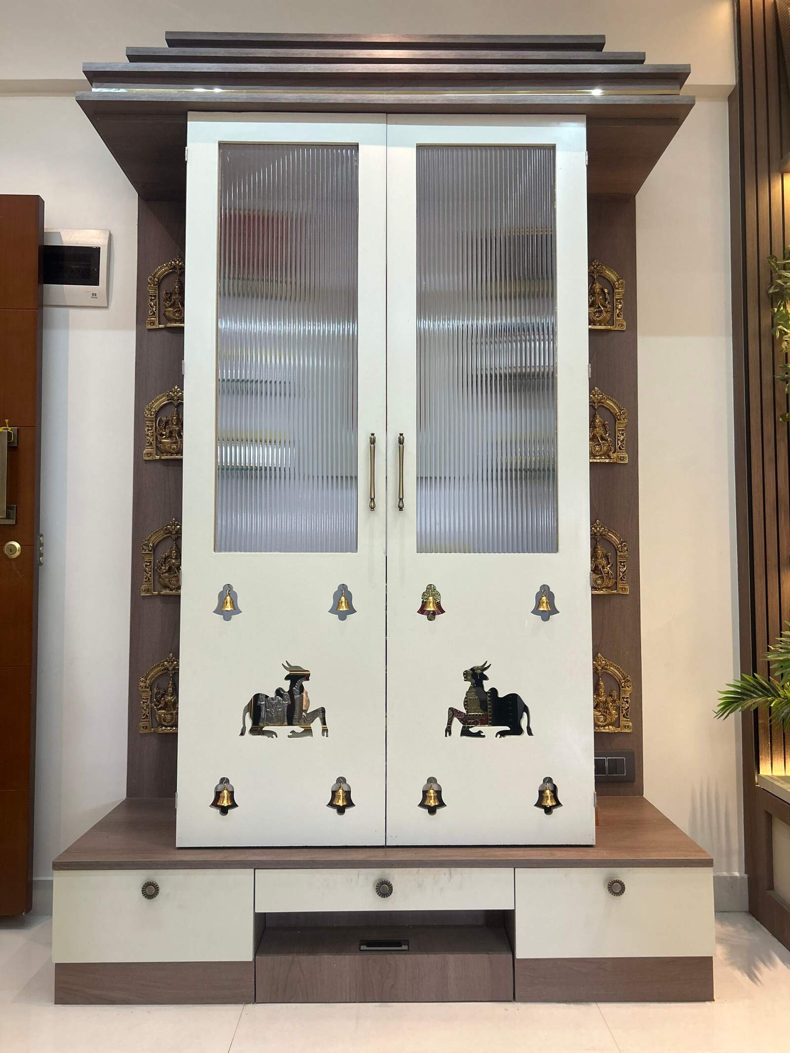 Modern pooja room interior in a Bangalore home designed by Olangana Design’s.