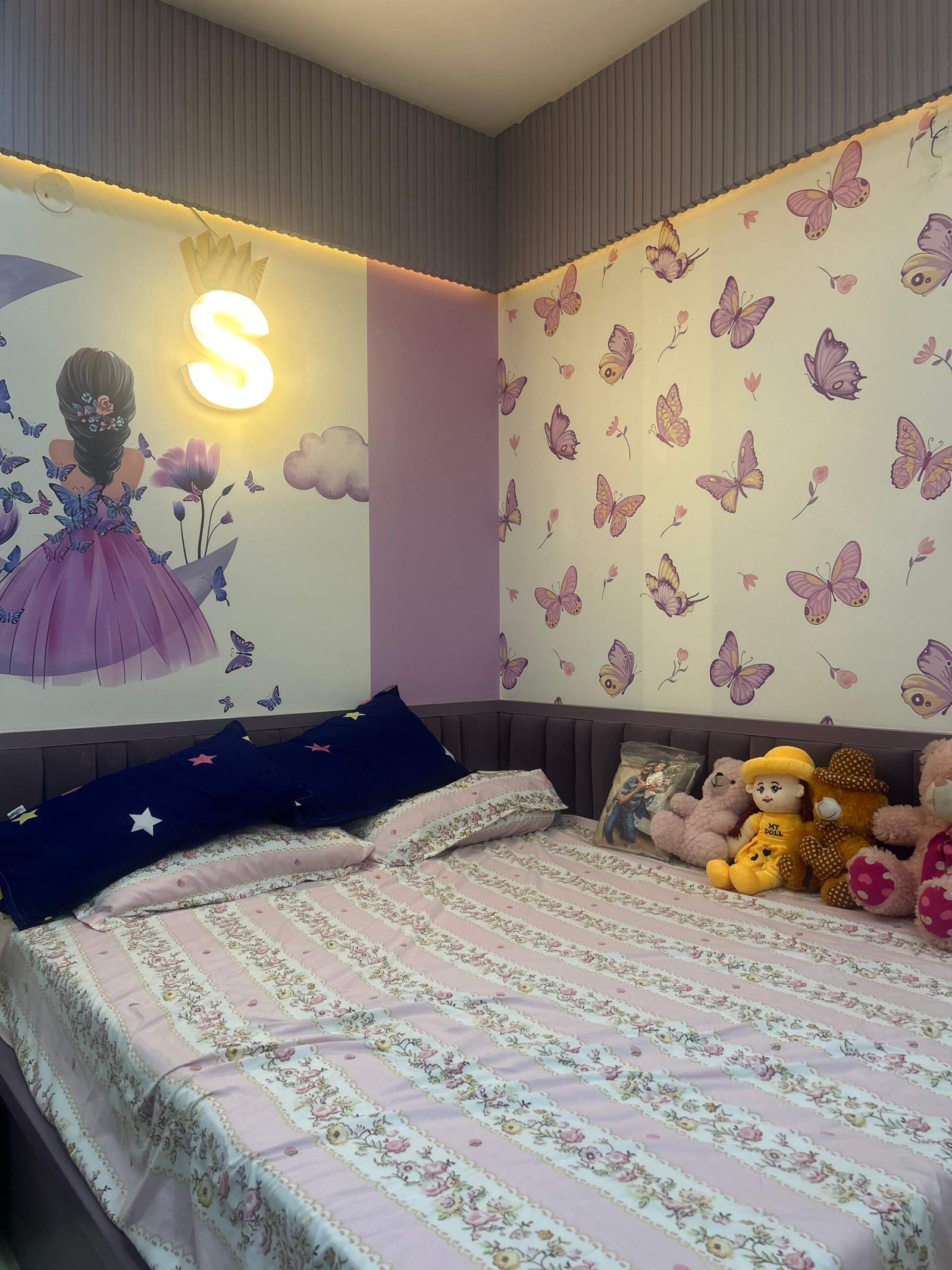 Girls bedroom interior with moon and butterfly theme in a Bangalore home by Olangana Design’s.