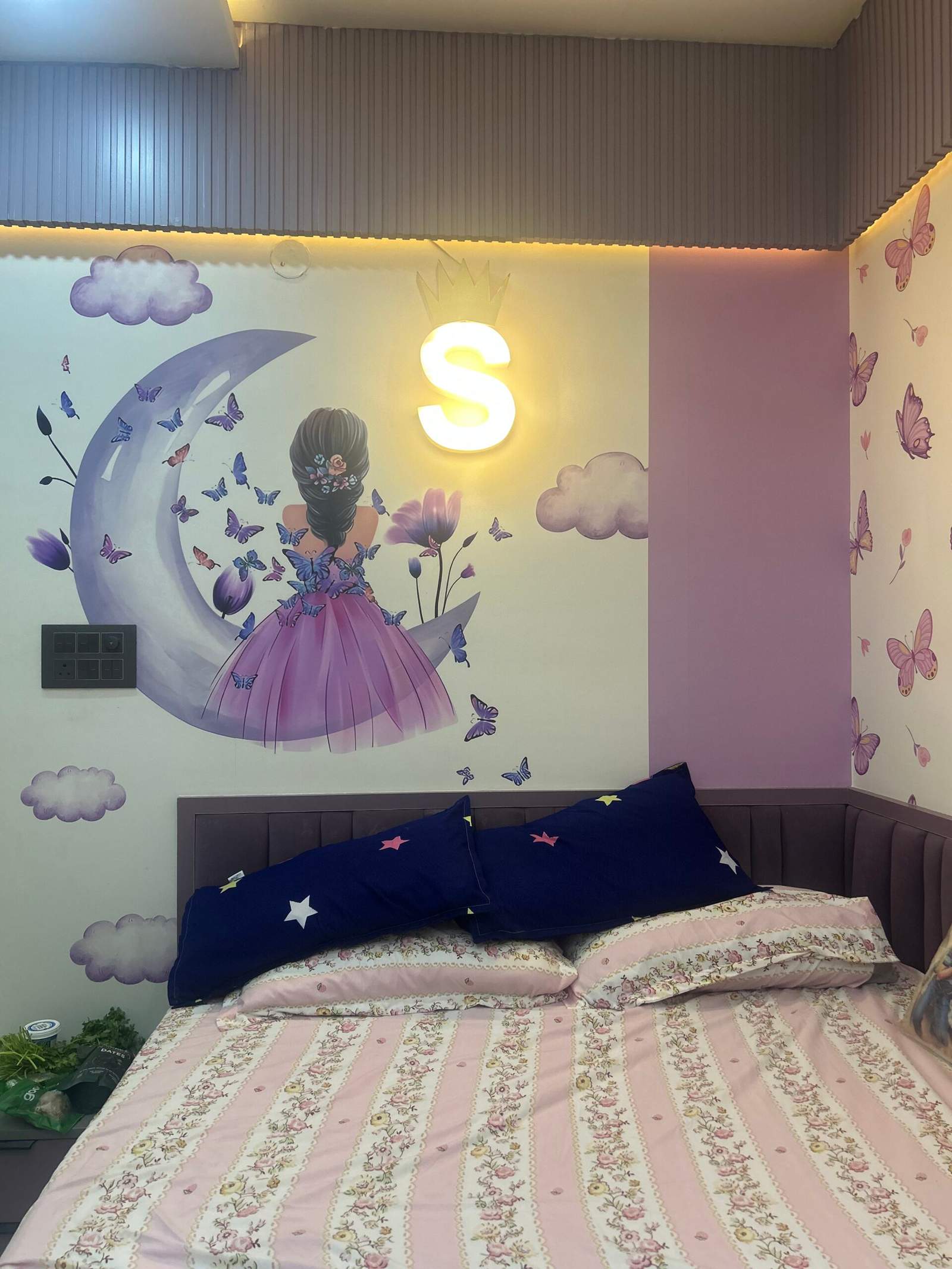 Young girl bedroom interior with half moon wall design in a Bangalore home by Olangana Design’s.