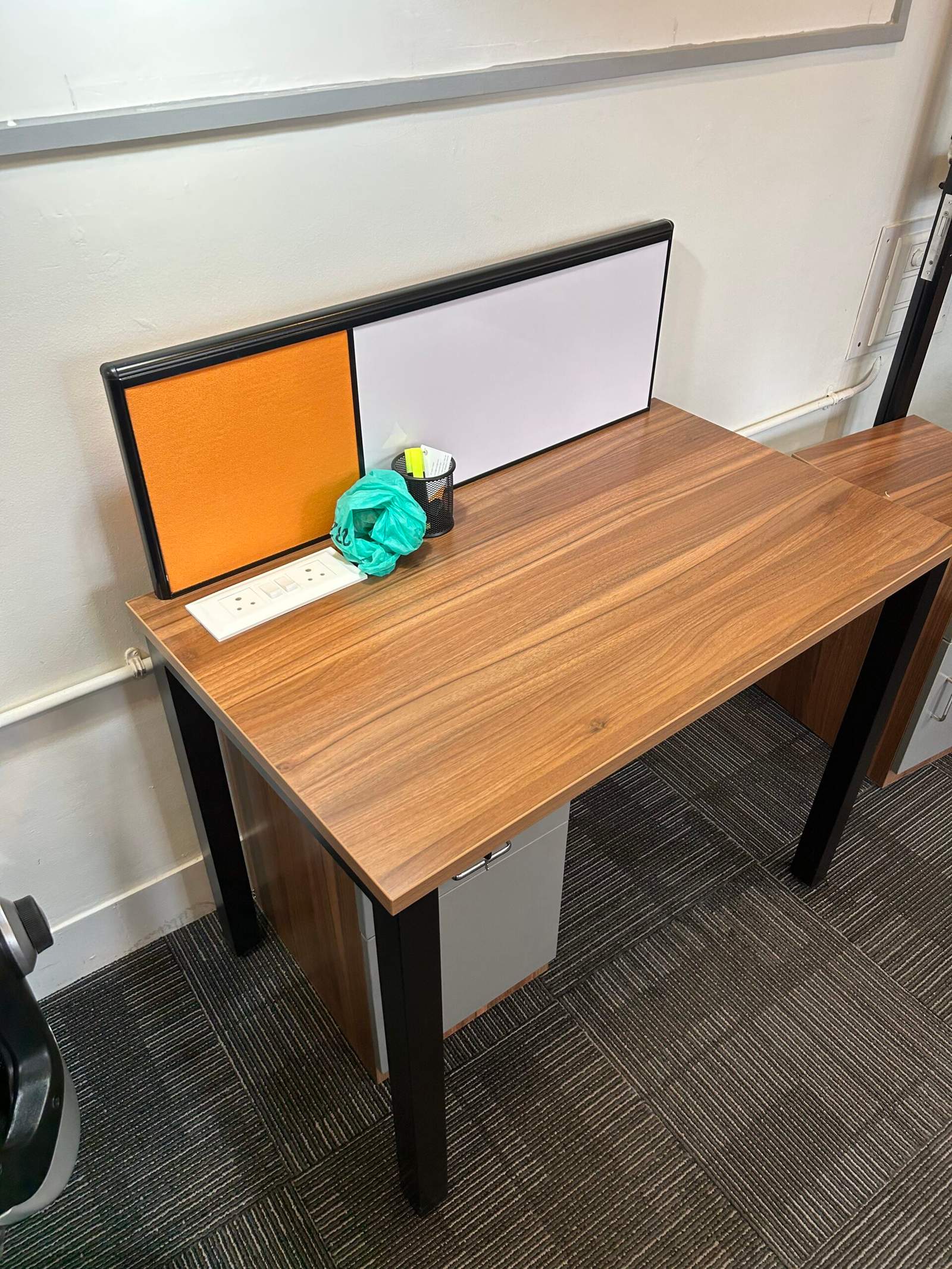 Compact office drawer cabinet placed under working desk for storage in Bangalore office interior by Olangana Designs
